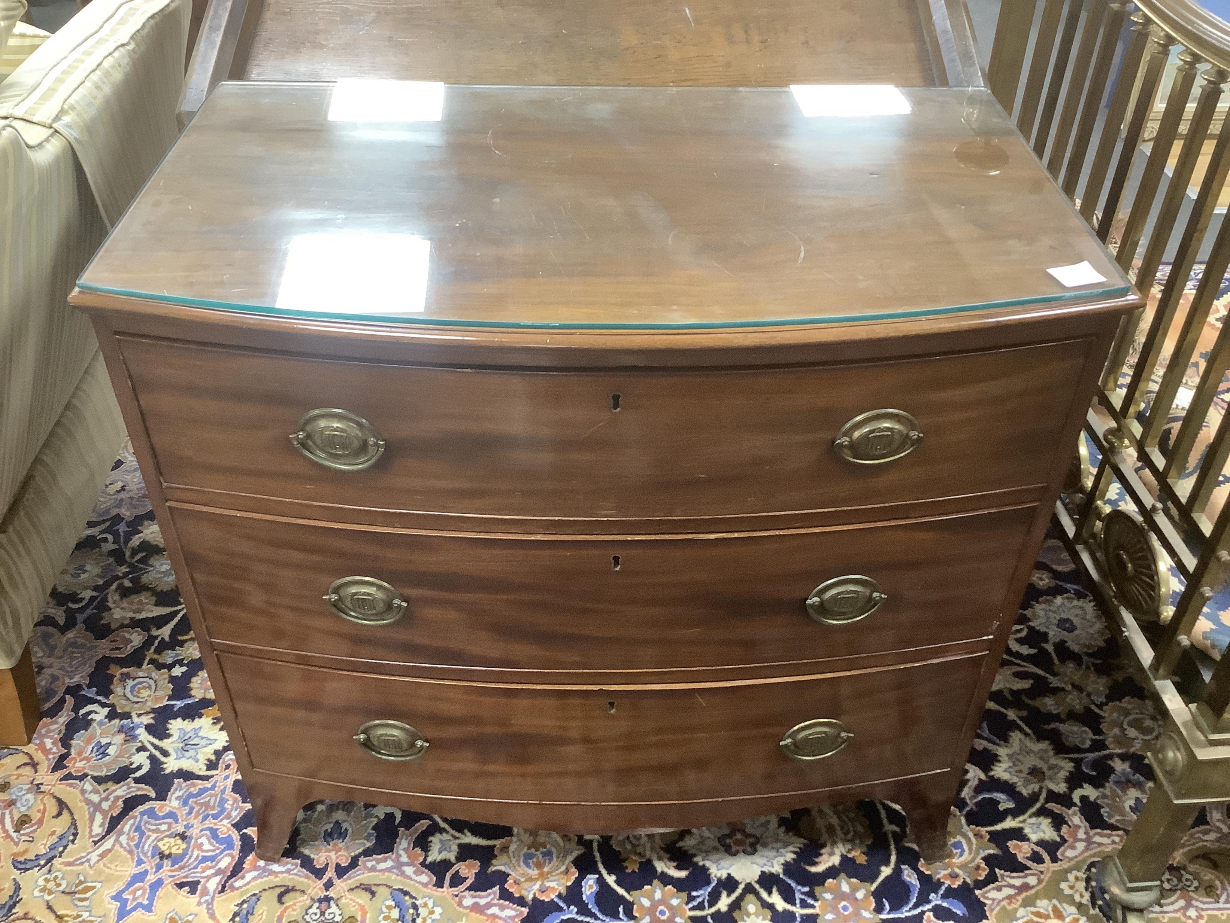 A small Regency mahogany bowfront chest, width 93cm, depth 54cm, height 86cm. Condition - fair